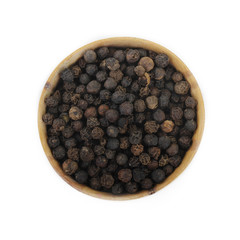 black peppercorn in wooden cup  isolated