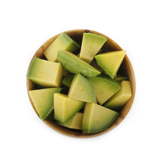 avocado slices in wooden cup isolated