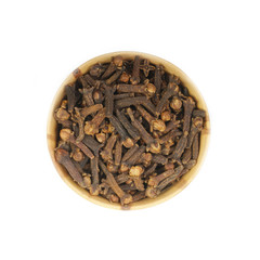 cloves in wooden cup isolated