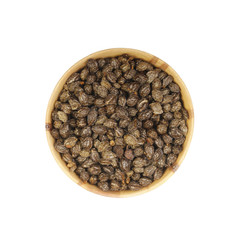 seed of paw paw in wooden cup isolated