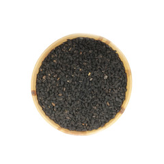 black caraway in wooden cup isolated