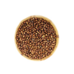 melegueta in wooden cup isolated