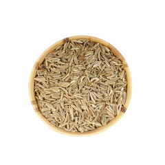 cumin in wooden cup isolated