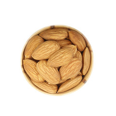 almonds in wooden cup isolated