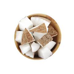 slices of coconut in wooden cup isolated