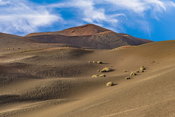 volcano landscape at sunset, national parc of Timanfaya in Lanzarote, Spain