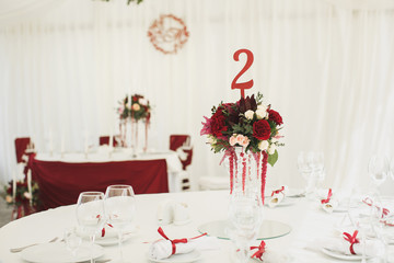 Beautiful Banquet hall under a tent for a wedding reception.