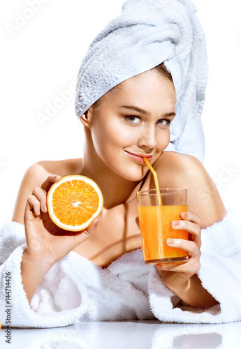 Pretty Woman After Bath In White Bathrobe And Towel On Her