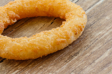 Fried Onion Ring on Wood Table