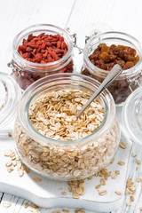 oat flakes and dried berries for breakfast, top view