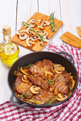 classic pork stew with onion, mushrooms