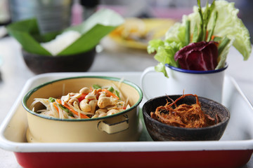 Local Thai food somtum with pork amd sticky rice