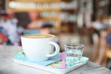 cappuccino coffee on wood background