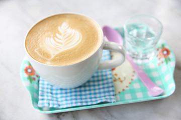 cappuccino coffee on wood background
