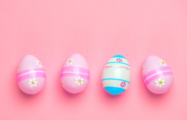 Colorful Easter eggs isolated in pink background