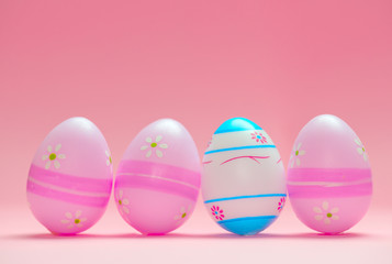 Colorful Easter eggs isolated in pink background