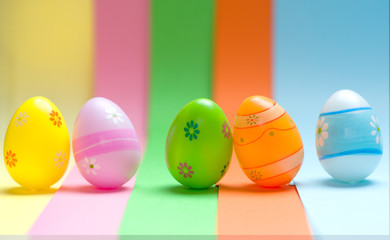 Colorful Easter eggs on colorful background