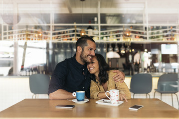 Smiling couple of lovers having fun.