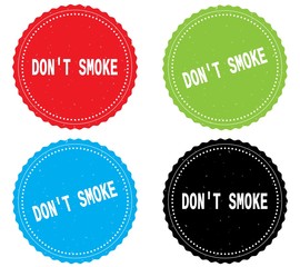 DON'T SMOKE text, on round wavy border stamp badge.