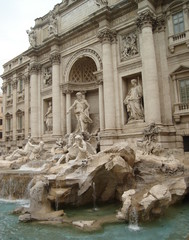 Trevi Fountain in Rome, Italy on a cloudy day, no people.