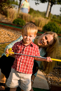 Golf: Mother And Child At Mini-Golf Course