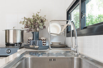 modern kitchen room design with faucet and  sink