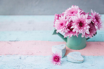 Summer Flowers in Watering pot with copy Space