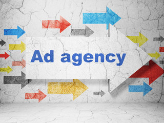 Advertising concept: arrow with Ad Agency on grunge wall background