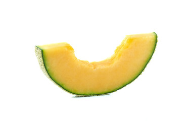 Melon slice on white background.