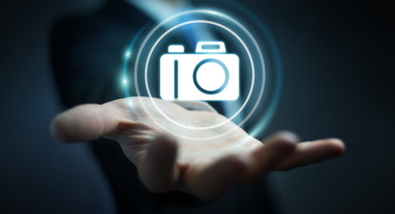 Businessman using modern camera application 3D rendering