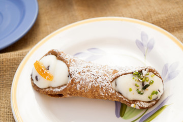 sicilian cannolo with filling of ricotta cream