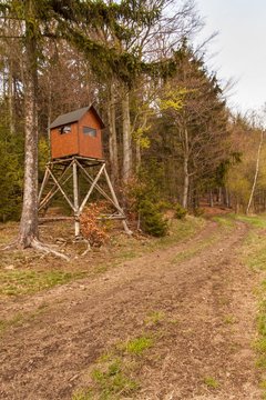 Hunting hide in the forest. Hunting stash. The wooden tower.