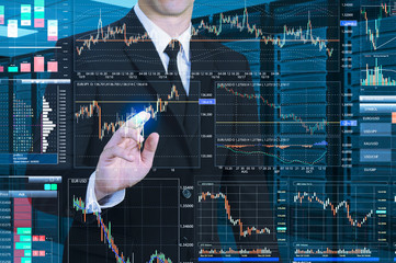 businessman working with virtual investing scree