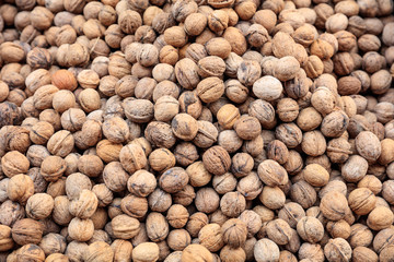 Whole walnuts in shell background