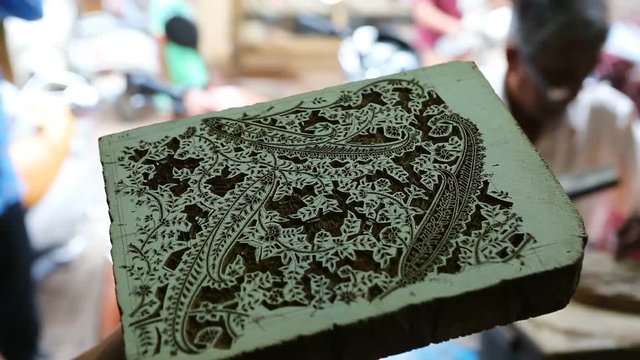 Craftsman making a wooden block for Block Printing for Textile in India. Mumbai, Maharashtra, India.