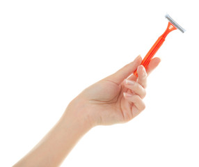 Female hand with safety razor on white background