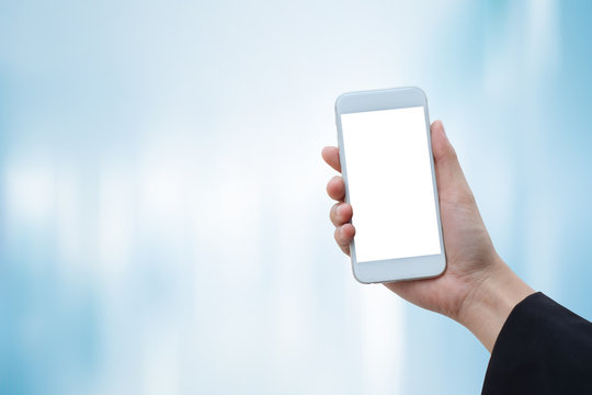 close up soft focus on business woman holding blank screen display smartphone :business and technology concept.