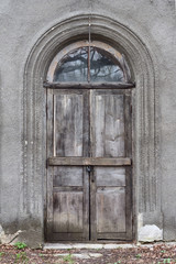Fototapeta na wymiar Old ancient door with old grunge brick wall