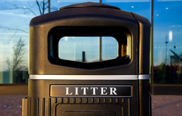 Clean litter bin in city.
