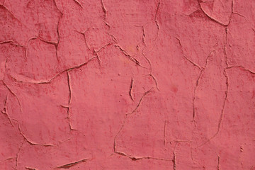 Old shelled red painted wall