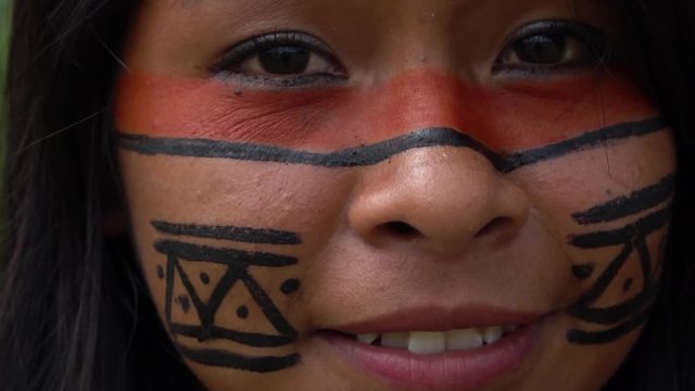 Closeup face of Native Brazilian Woman at an indigenous tribe in the Amazon