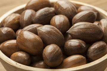 Bowl with whole pecan nuts