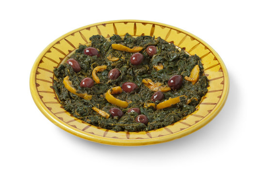  Moroccan dish with spinach, olives and preserved lemon