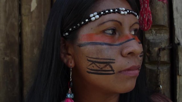 Closeup face of Native Brazilian Woman at an indigenous tribe in the Amazon