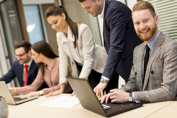 Group of buseness people who are seriously working on a new project in the office