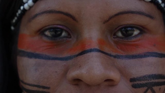 Closeup face of Native Brazilian Woman at an indigenous tribe in the Amazon