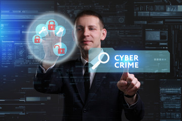 Business, Technology, Internet and network concept. Young businessman working on a virtual screen of the future and sees the inscription: Cyber crime