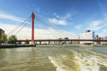 The bridge Willemsbrug in Rotterdam seen from the water