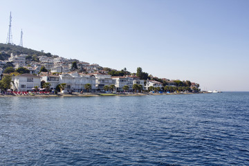 Naklejka premium View of beach in Kinaliada which is one of Prince Islands also known as Adalar in Istanbul. Summer houses are in the view. It is the closest one to Istanbul