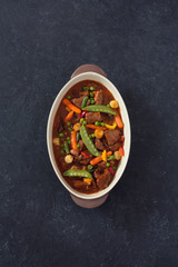Beef goulash with mushrooms and vegetables